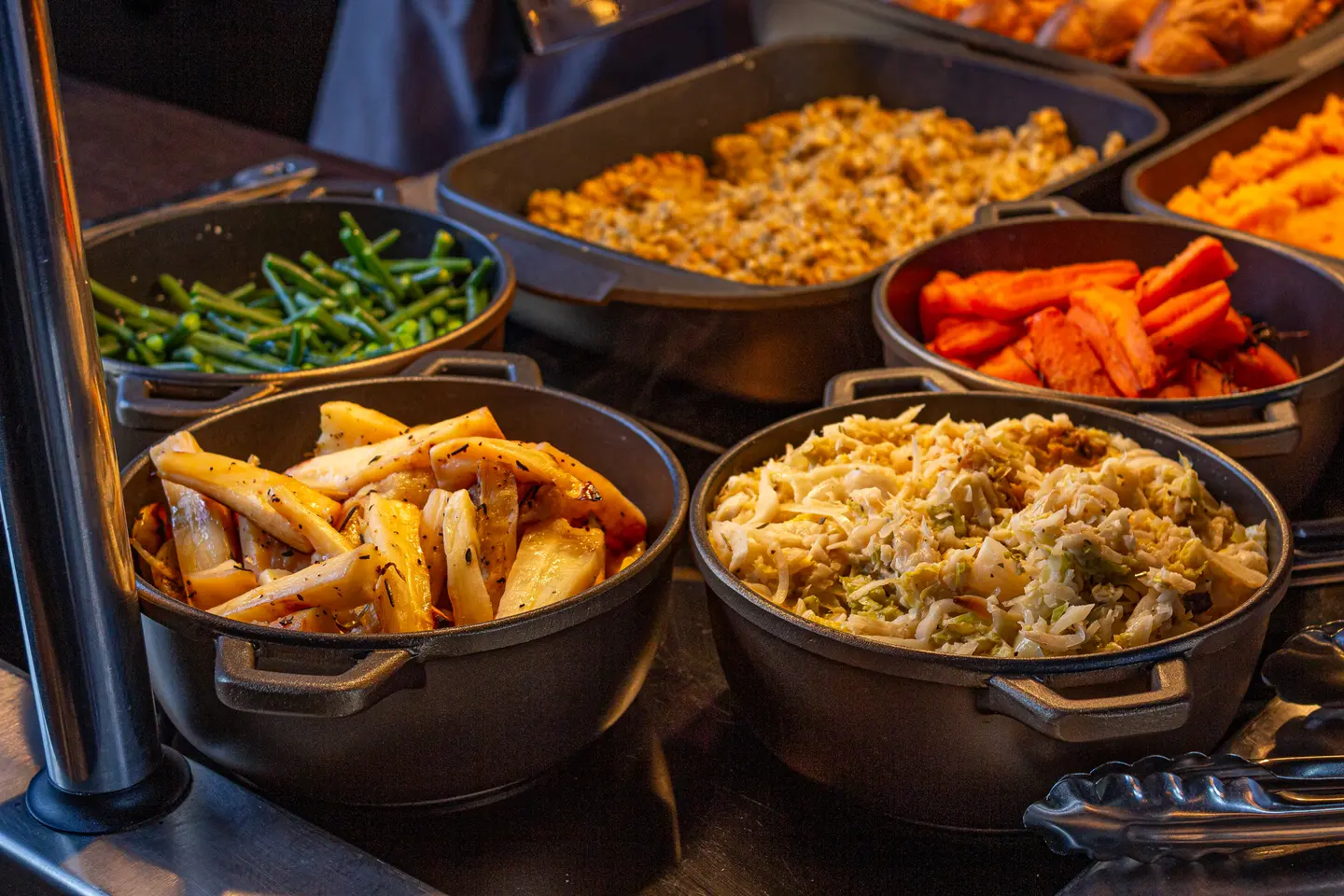 Pots of green beans, roast parsnips, carrots and cabbage on the carvery at The Little John